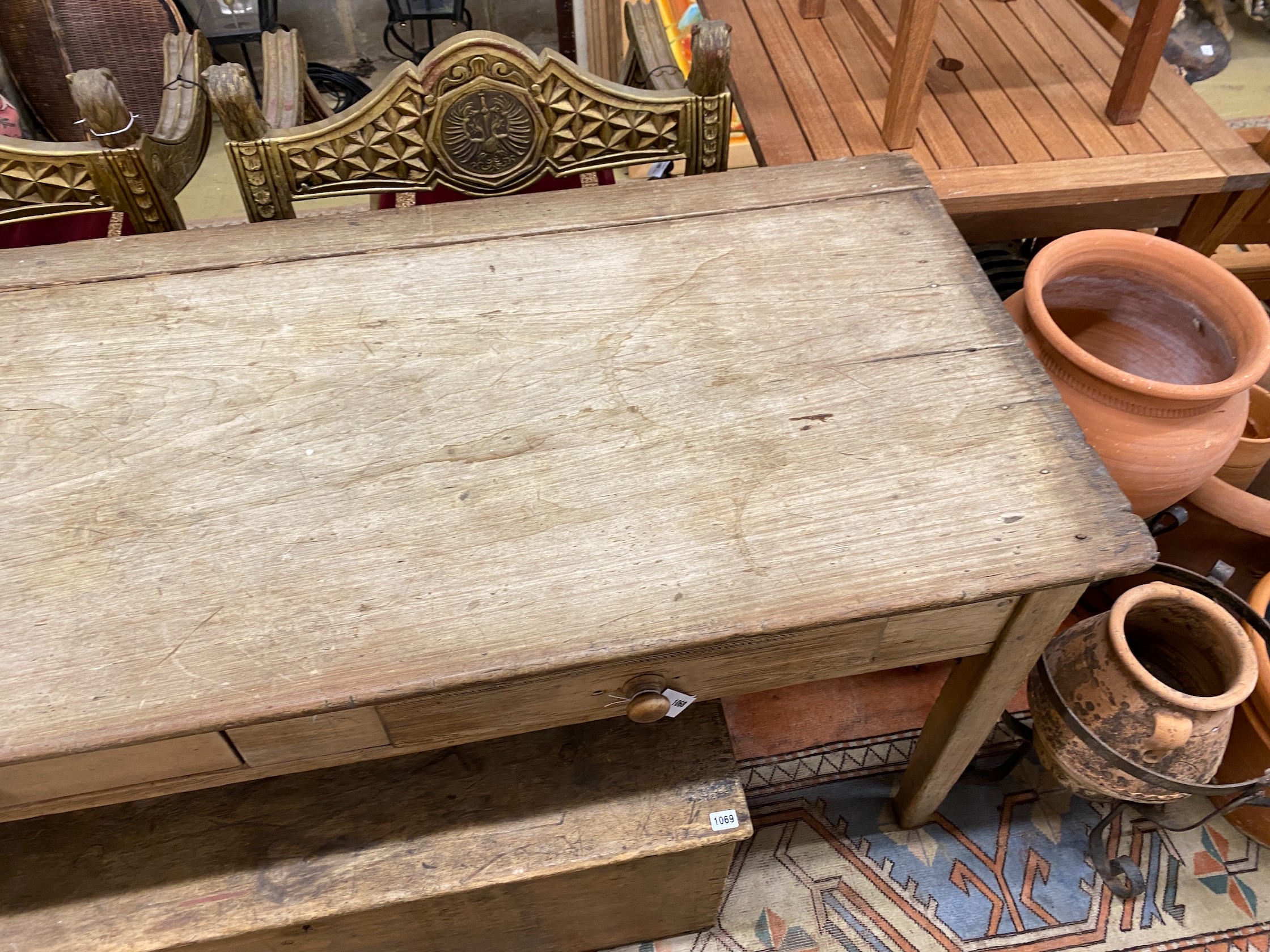 A Victorian two drawer pine kitchen serving table, length 180cm, depth 77cm, height 80cm